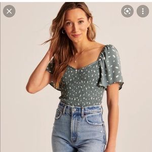 Smocked flutter sleeve top